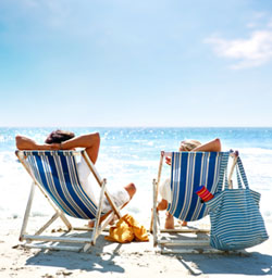 Couple in beach chairs on the beach